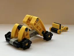 42225 Mini Dumper Truck and a pickup truck