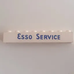 Brick 1 x 8 with 'ESSO SERVICE' Short Blue Print / White