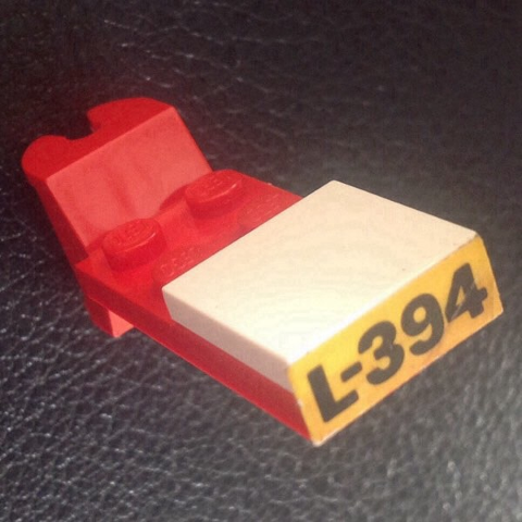 Lego Stickered Assembly 5 x 2 x 2/3 with Black 'L-394' on Yellow Background Pattern (Sticker) - Set 394
