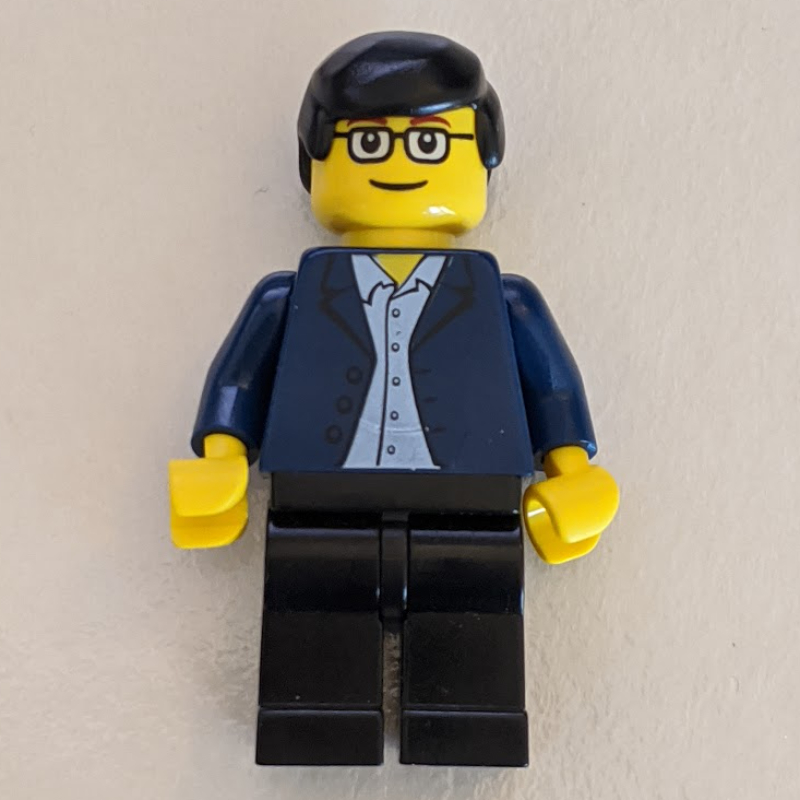 Lego Man - Dark Blue Jacket, Black Legs, Glasses