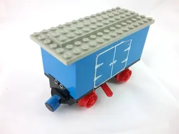 Train Battery Box Car with Three Contact Holes, Red Switch Lever, Blue and Red Magnets, Red Wheels, and Light Gray Roof with Hinged Doors Pattern on Both Sides (Stickers) - Set 7720