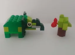Green Elephant with a tree.