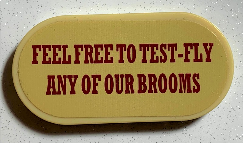 Lego Tile, Round 2 x 4 Oval with 'FEEL FREE TO TEST-FLY ANY OF OUR BROOMS' Pattern (Sticker) - Set 75978