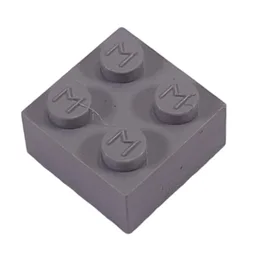 Modulex Brick 2 x 2 with M on Studs / Modulex Light Orange