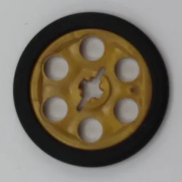 Technic Wedge Belt Wheel (Pulley) with Black Technic Wedge Belt Wheel Tire (4185 / 2815) / Pearl Gold