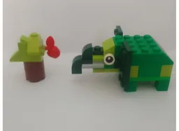 Green Elephant with a tree.