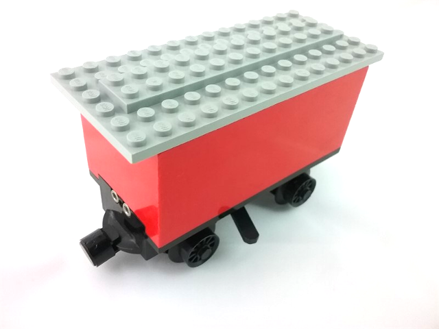 Lego Train Battery Box Car with Three Contact Holes, Black Switch Lever, Black Magnets, Black Wheels, and Light Gray Roof
