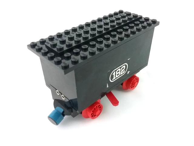 Lego Train Battery Box Car with Two Contact Holes, Red Switch Lever, Blue and Red Magnets, Red Wheels, and Black Roof with '182' Pattern on Both Sides (Stickers) - Set 182