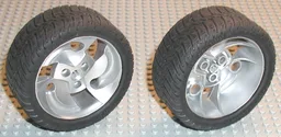 Wheel 81.6 x 34 ZR Three Spoke Swirl, with Black Tire 81.6 x 34 ZR Thin Sporty Tread (32197 / 32196) / Metallic Silver