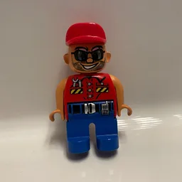 Duplo Figure, Early, Cap Red, Blue Legs, Shirt with Pockets and Wrench, Belt with Silver Buckle, Sunglasses and Beard Print / Red