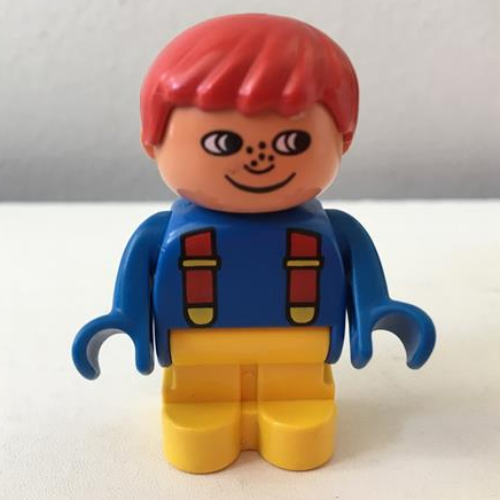 Lego Duplo Figure, Early with Joined Legs Yellow, Blue Top with Red Suspenders, Red Hair, Freckles, White in Eyes Print / Blue