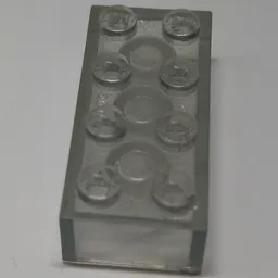 Brick 2 x 4 with Old Logo on Studs and without Cross Supports / Trans-Clear