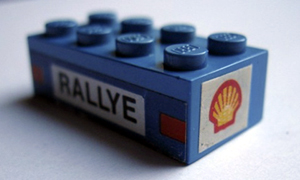Lego Brick 2 x 4 with 'RALLYE' and Taillights on Side and Shell Logo on Ends Pattern (Stickers) - Set 619