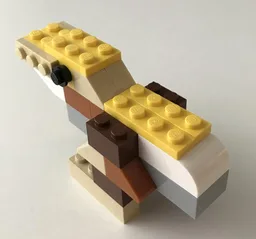 10696 Tan dinosaur