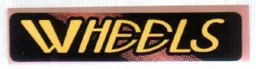 Tile 1 x 4 with Yellow 'WHEELS' on Black and Red Pattern Model Left Side (Sticker) - Set 8219
