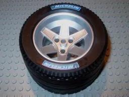 Wheel 62mm D. x 46mm Technic Racing Large, with Black Tire Technic Racing Large with 'MICHELIN' White Pattern (22969 / 32296pb02) / Metallic Silver