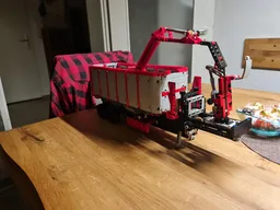 Dump trailer with crane