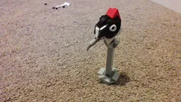 Collectable Bird Heads: Downy Woodpecker