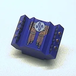 Brick Sloped 2 x 2 No Studs with Angled Side Block Extensions and Pulse Print / Violet