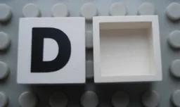 Modulex Tile 2 x 2 with Black 'D' Print, without Internal Supports