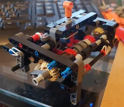 5 speed gearbox with realistic "H" pattern shift, neutral and optional reverse