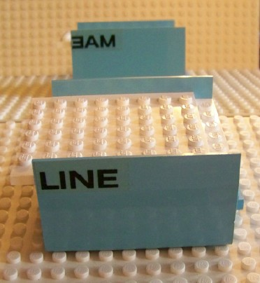 Lego Boat, Hull Smooth Middle 8 x 6 x 3 1/3 with White Deck with Black 'LINE' and 'MAE' Pattern (Stickers) - Set 1650