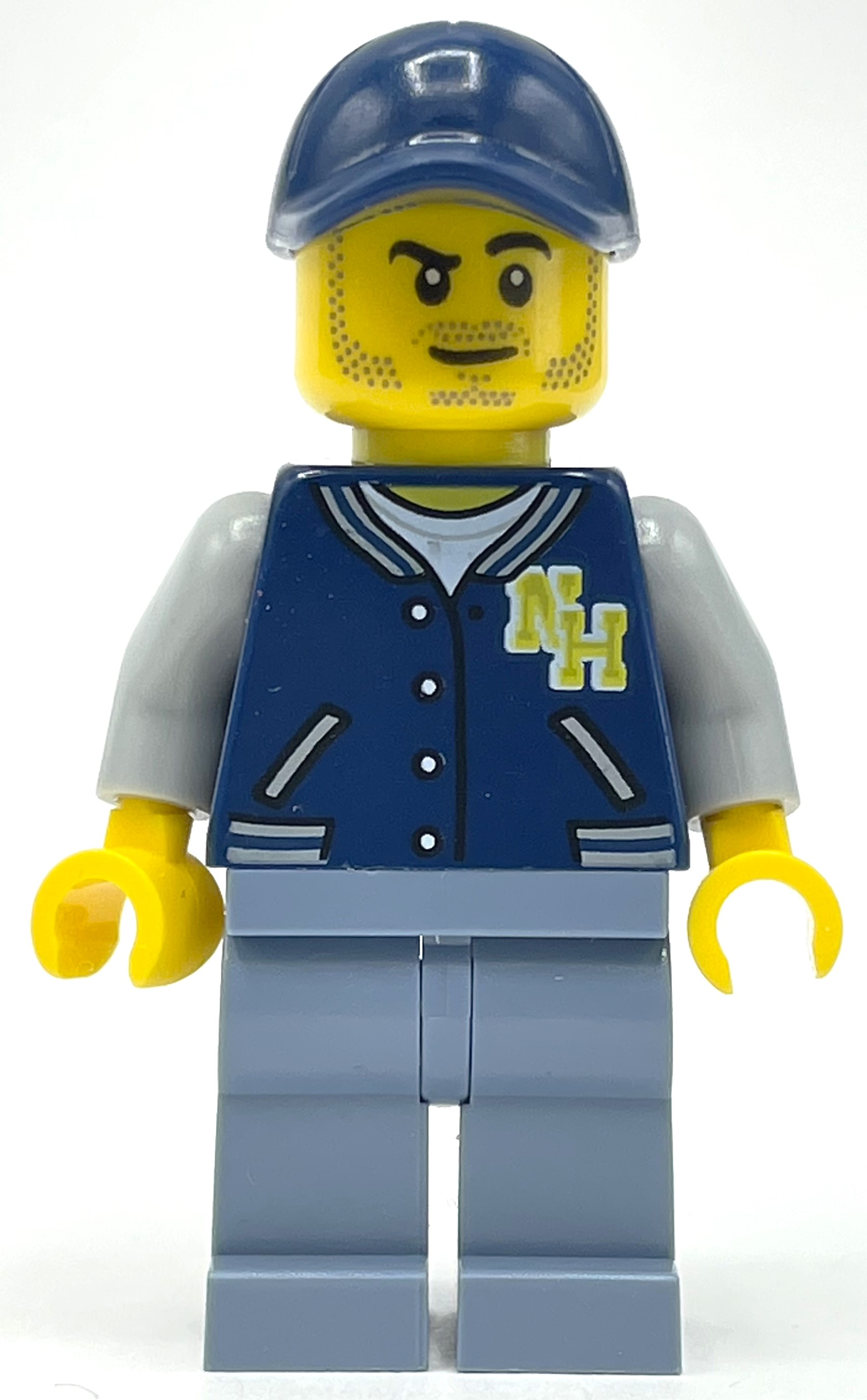 Lego Man, Dark Blue Letterman Shirt with 'NH', Sand Blue Legs, Dark Blue Cap, Stubble