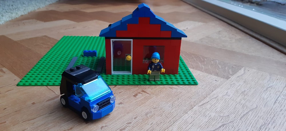 Lego House and a car