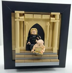 Malfoy kicks Dobby