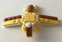 10696 Yellow dinosaur
