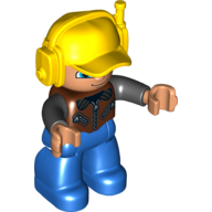 Lego Duplo Figure with Headset and Cap Yellow, with Blue Legs, Brown Vest with Zippers over Black Shirt, Blue Crescent Eyes / Reddish Brown