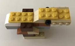 10696 Tan dinosaur