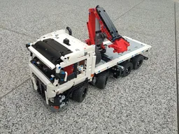 Flatbed truck with crane