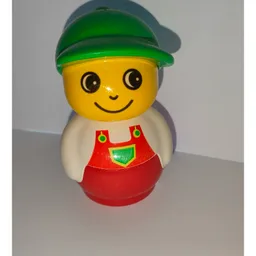 Primo Figure Boy with Red Base, Red Dungarees Print, Green Cap / White