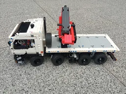 Flatbed truck with crane