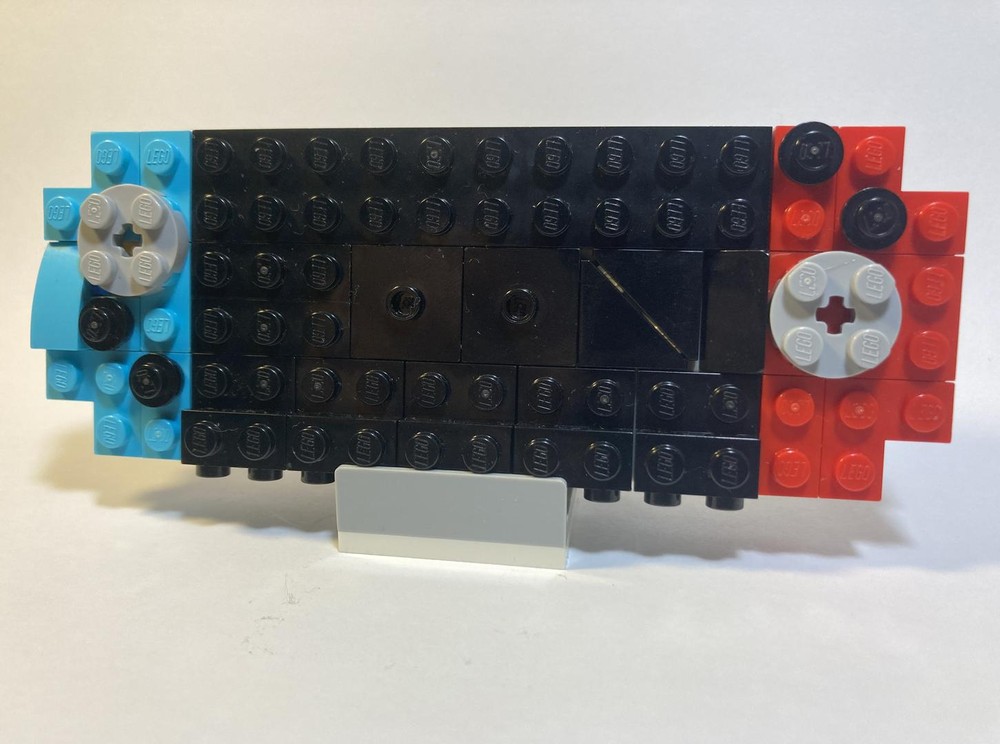 Lego 31113 Nintendo Switch + handle grip