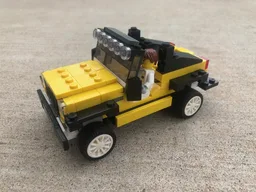 76897 Yellow Jeep Wrangler