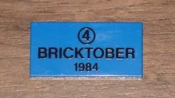 Tile 2 x 4 with Black Number 4 in Circle and 'BRICKTOBER 1984' Pattern