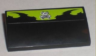 Lego Slope, Curved 2 x 4 x 2/3 with Bottom Tubes with Pistons Skull Logo Pattern (Sticker) - Set 8211