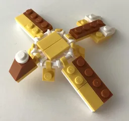 10696 Yellow dinosaur