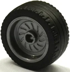 Wheel 18mm D. x 12mm with Axle Hole and Stud with Black Tire 24 x 12 Low (18976 / 18977)