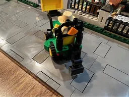 John Deere 1025R tractor with backhoe