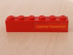 Brick 1 x 6 with Yellow 'LONDON TRANSPORT' Text on Red Background Pattern Model Right Side (Sticker) - Sets 384 / 760-2