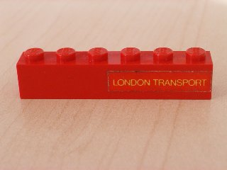 Lego Brick 1 x 6 with Yellow 'LONDON TRANSPORT' Text on Red Background Pattern Model Right Side (Sticker) - Sets 384 / 760-2