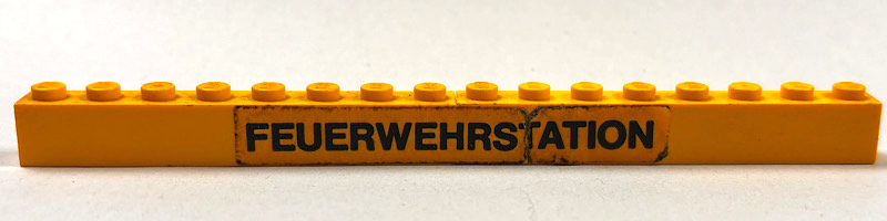 Lego Stickered Assembly 16 x 1 x 1 with Black 'FEUERWEHRSTATION' Pattern (Sticker) - Set 374-1