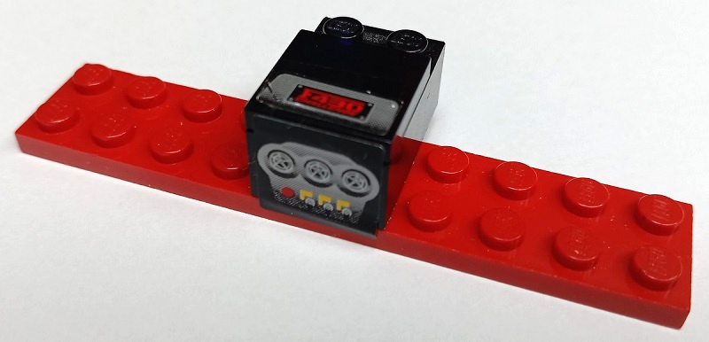 Lego Stickered Assembly 10 x 3 x 1 2/3 with Ferrari Centre Console with Red 'F430 CHALLENGE', Yellow Buttons, Switches and Air Vents Pattern (Stickers) - Set 8143