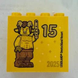Brick 2 x 4 x 3 with 'LEGOLAND Deutschland Resort 15 2025', (Besuchsmeister Gold) Print / Yellow