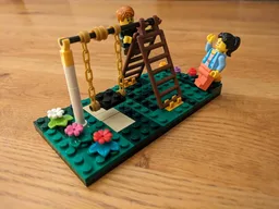 Climbing frame and swing