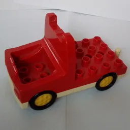 Duplo Truck with 4 x 4 Flatbed Plate, White Base, Yellow Hubs / Red