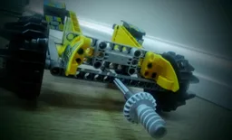Wheel driven mining tool